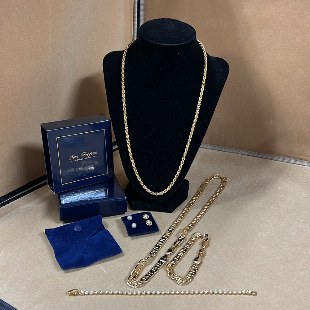 Costume, jewelry, two necklaces, two bracelets, and two pair of earrings